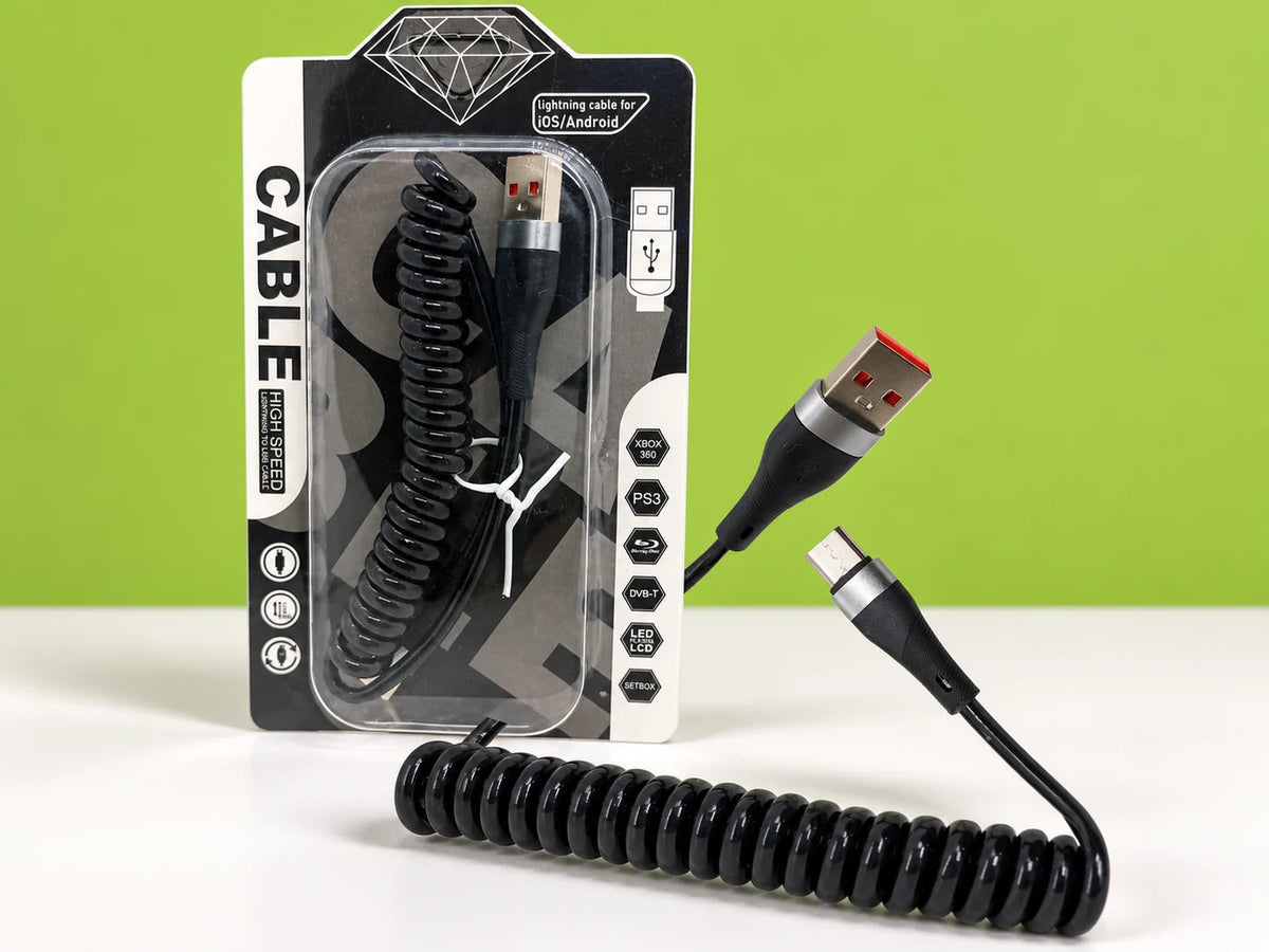 Ilustración IA — cable espiral usb a a usb c 66w — vista de detalle. Objetos de ambientación no incluidos.