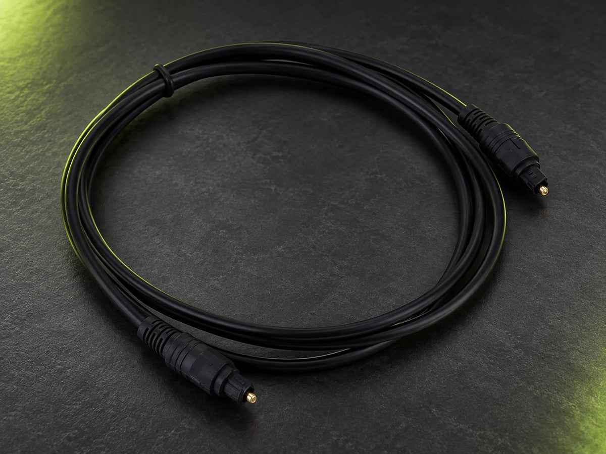 Ilustración IA — cable optico de audio 10 metros — presentación sobre mesa. Objetos de ambientación no incluidos.